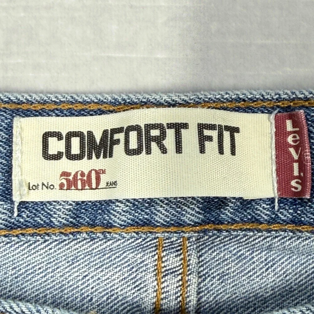 Levi's 560 Comfort Fit Jeans Mens 42x30 Blue Denim Light Wash Distressed Stained